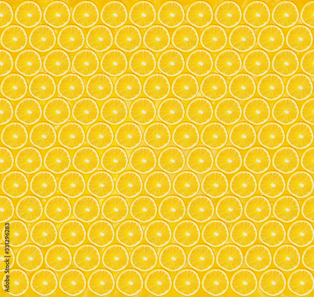Texture of sliced orange slices on yellow background. Healthy lifestyle Texture of sliced orange slices on yellow background. Healthy lifestyle