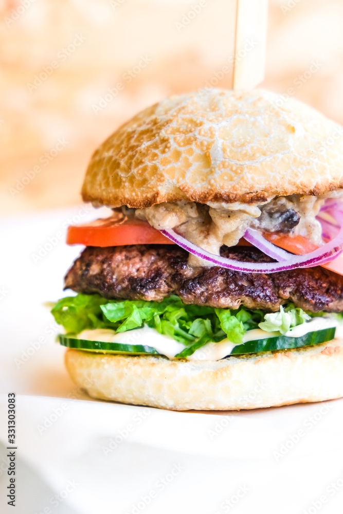 powerful burgers with juicy cutlets, fresh vegetables and crispy buns. powerful burgers with juicy cutlets, fresh vegetables and crispy buns.