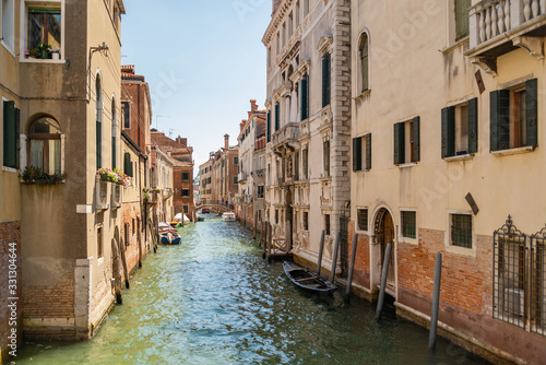 Beautiful view of the canal with a floating boats © Enrico Della Pietra