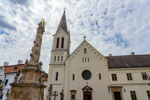 Views of the city of Veszprem with king Saint Stephen / Szent Istvan cathedral and trinity statue on the trinity square