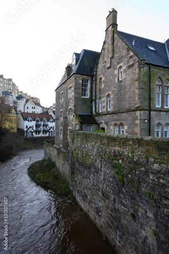 View on old houses in Dean village in New Town part of Edinburgh city, capital of Scotland, in sunny winter day