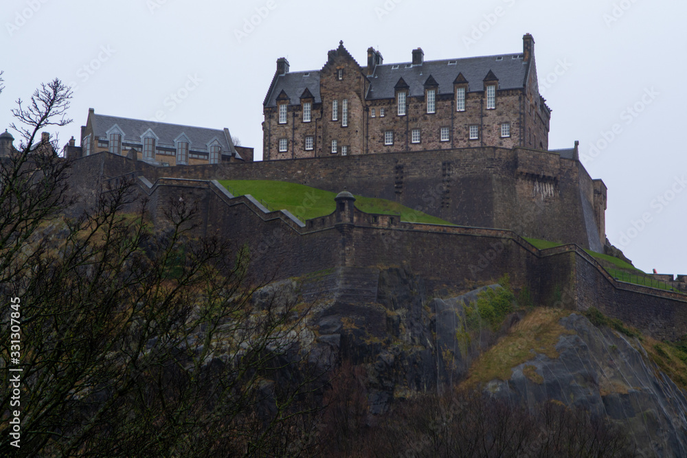 View on Castle hill in old part of Edinburgh city, capital of Scotland, in rainy winter day.