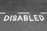 Disabled parking space signalization on the pavement