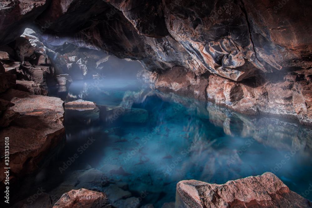 cave with blue geothermal pool - obrazy, fototapety, plakaty 