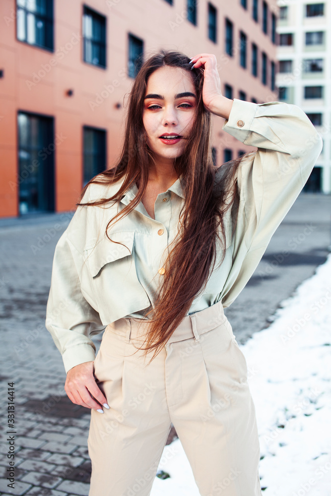 young pretty teenage girl posing cheerful happy smiling wearing street style outside in europe city, lifestyle people concept young pretty teenage girl posing cheerful happy smiling wearing street style outside in europe city, lifestyle people concept