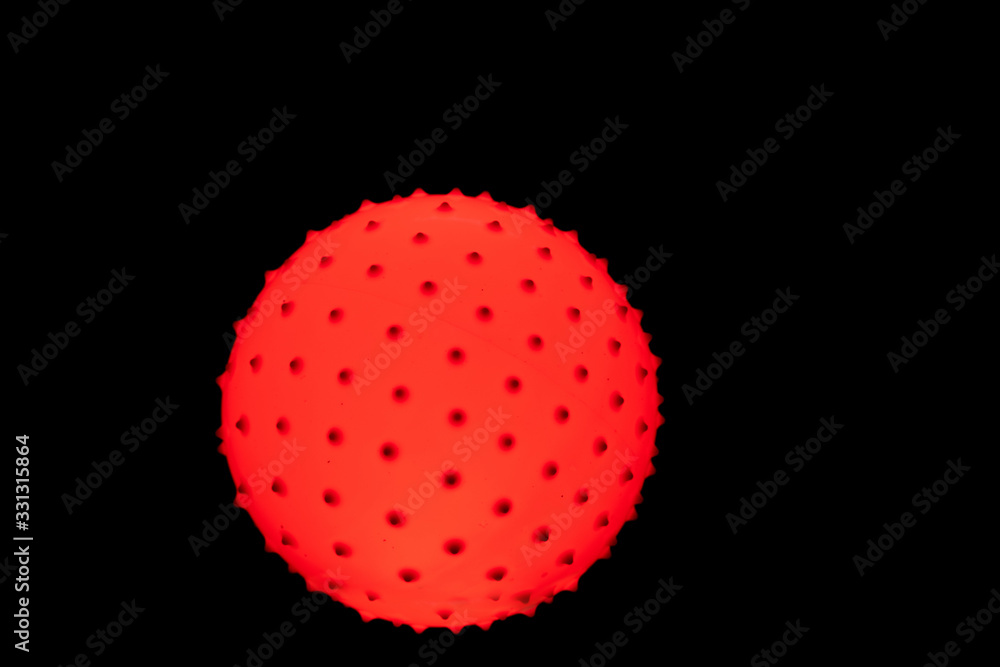 A coronavirus molecule on a black background A coronavirus molecule on a black background