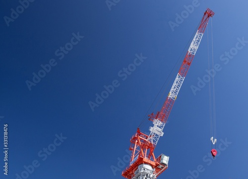 Tower crane blue sky background photo