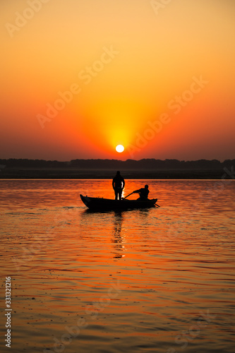 Rowing boat during Ganges sunrise