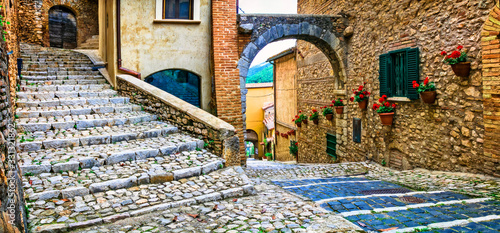 Fototapeta Naklejka Na Ścianę i Meble -  Charming floral streets of old traditional villages in Italy. Casperia, Rieti province