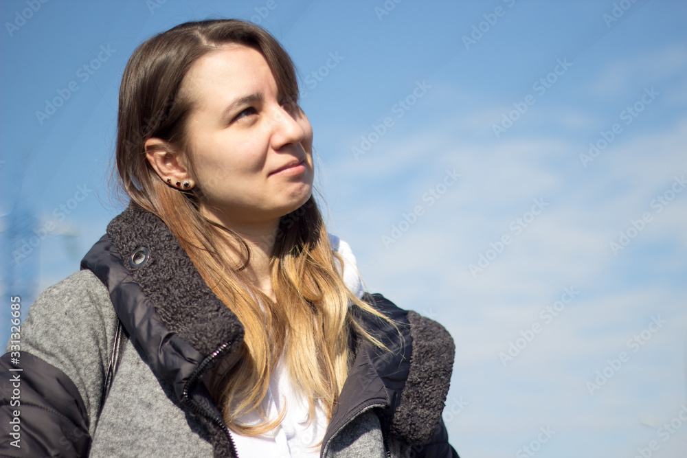 Beautiful girl with long curly hair outdoors Beautiful girl with long curly hair outdoors