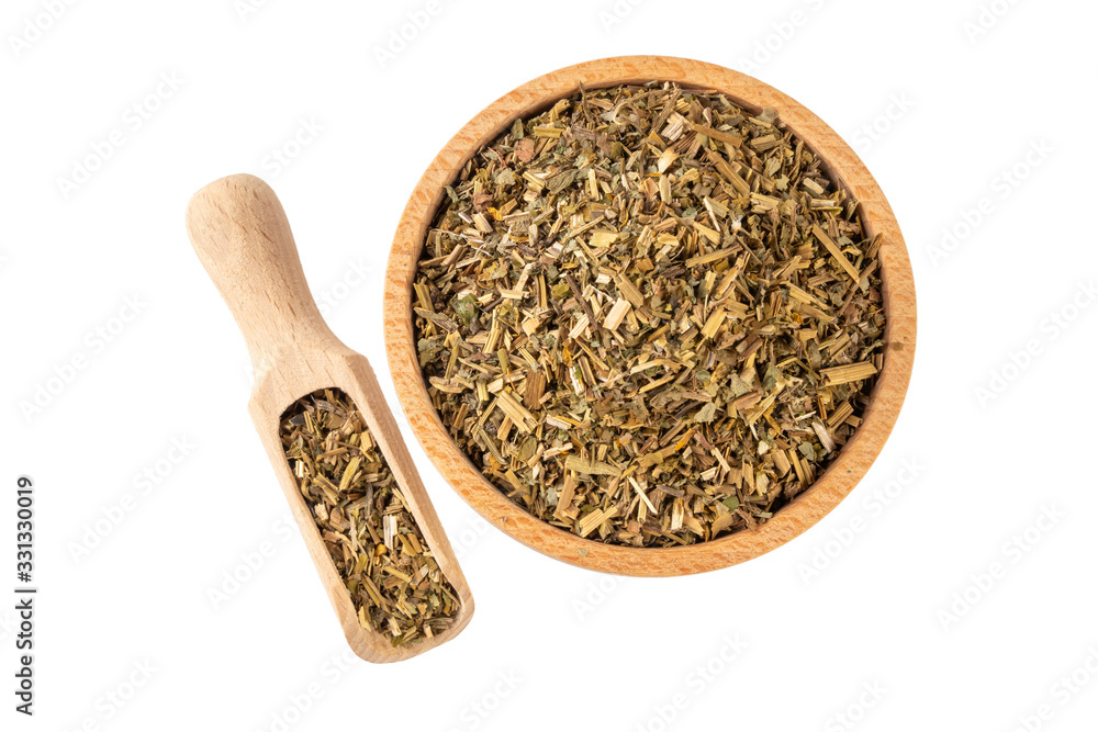 celandine or in latin Chelidonii harba in wooden bowl and scoop isolated on white background. medicinal healing herbs. herbal medicine. alternative medicine