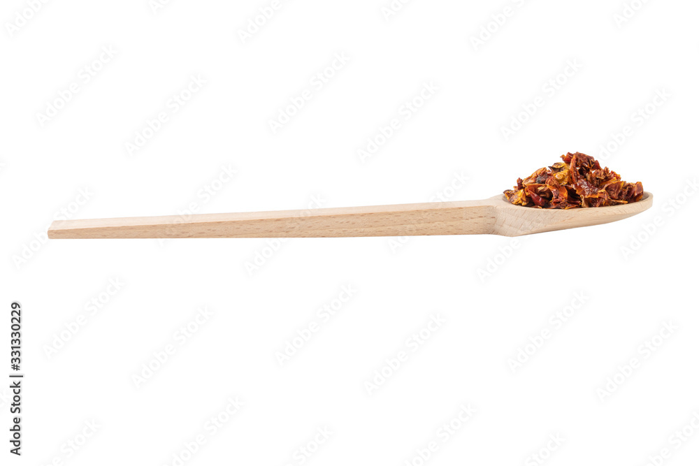 dried tomatoes in wooden spoon isolated on white background. spices and food ingredients. spices and food ingredients dried tomatoes in wooden spoon isolated on white background. spices and food ingredients. spices and food ingredients