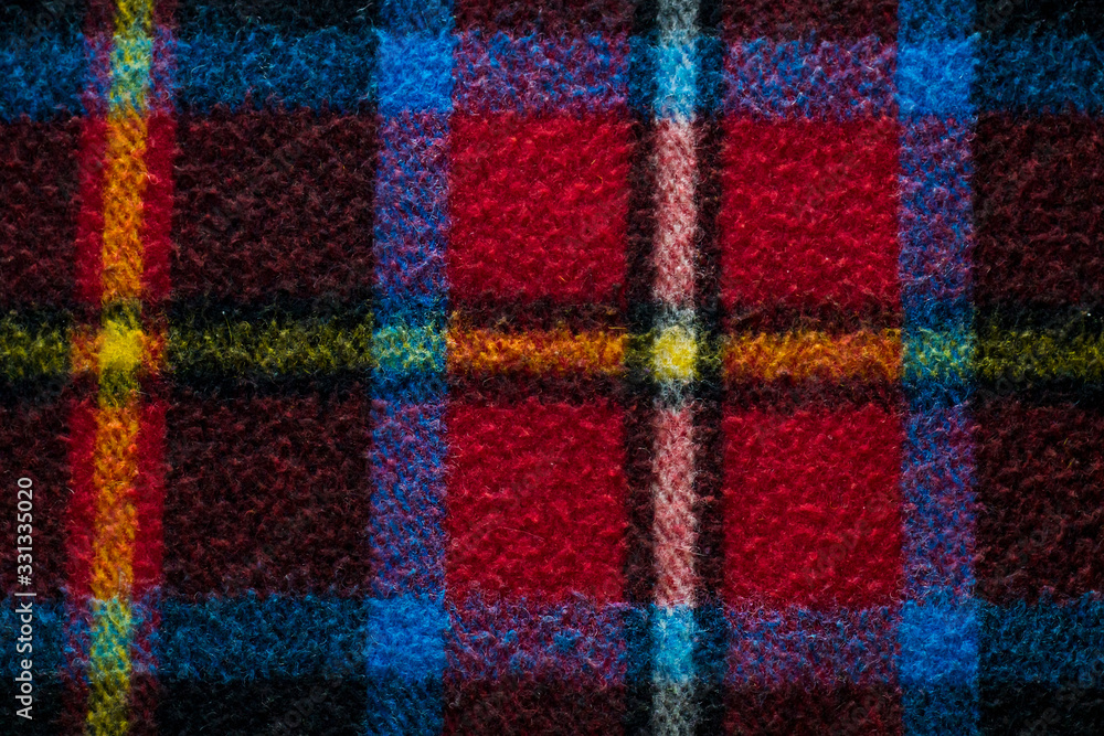 Wool,plaid scotch blanket background,flat laydown,top view and detailed taken.