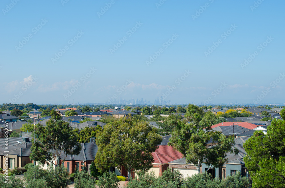 Aerial view of residential houses in Melbourne's suburb. Elevated view of Australian homes against blue sky. Copy space for text. Point Cook, VIC Australia. Aerial view of residential houses in Melbourne's suburb. Elevated view of Australian homes against blue sky. Copy space for text. Point Cook, VIC Australia.