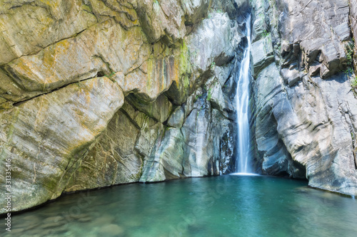 Fototapeta Naklejka Na Ścianę i Meble -  rock,cascade and pond water