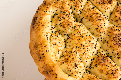 Fresh,Round Ramadan Bread on white with copy space