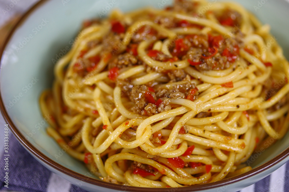 assiette de spaghetti au boeuf et poivron