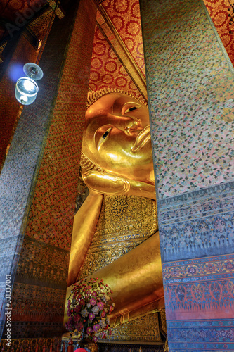 The Reclining Buddha at Wat Pho Temple, known as Temple of the Reclining Buddha (Bangkok, Thailand) photo