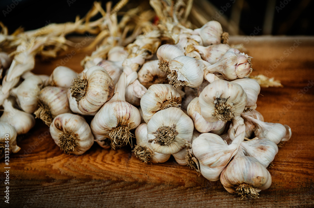 garlic for sale at a farmers market garlic for sale at a farmers market