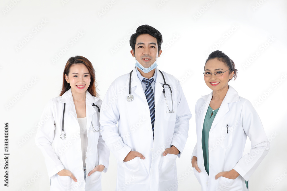 Asian Malay Chinese male female three doctors posing confident smile looking at camera on white background Asian Malay Chinese male female three doctors posing confident smile looking at camera on white background