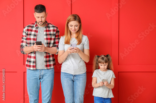 Family taking selfie on col...
