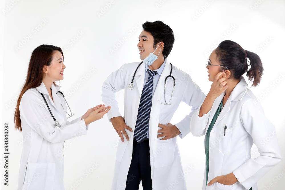 Asian Malay Chinese male female three doctors talking discussing happy on white background Asian Malay Chinese male female three doctors talking discussing happy on white background