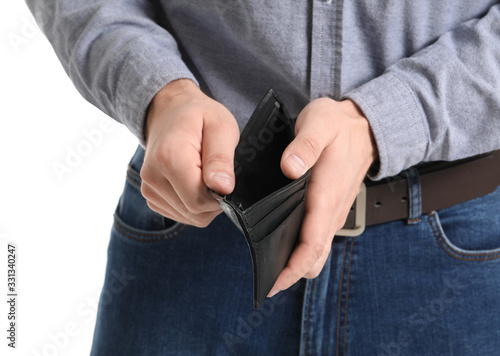 Man with empty purse on white background, closeup