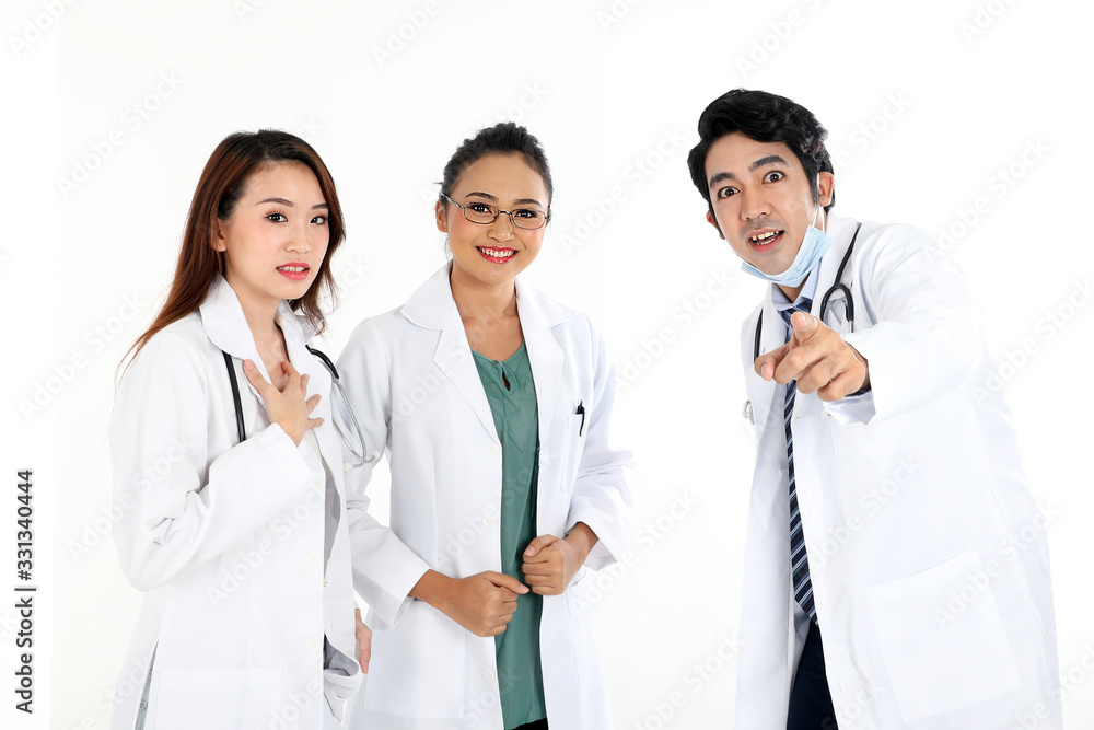 Asian Malay Chinese male female three doctors pointing towards camera on white background Asian Malay Chinese male female three doctors pointing towards camera on white background