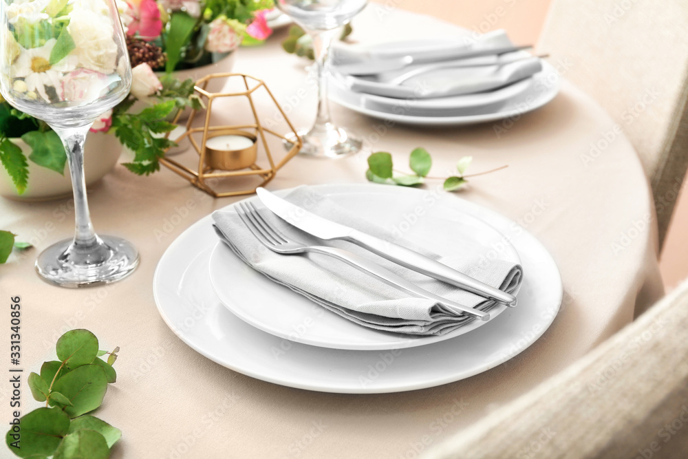 Beautiful table setting for festive dinner Beautiful table setting for festive dinner