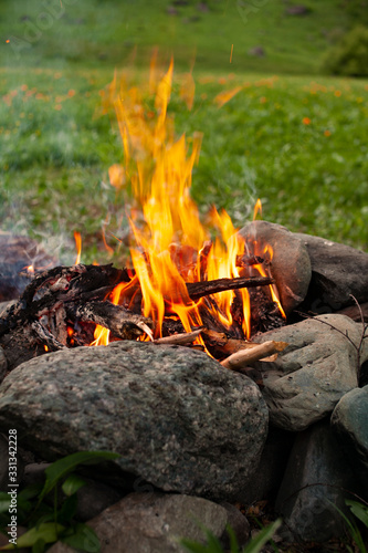 Tourist bonfire close-up. Summer. Dusk.
