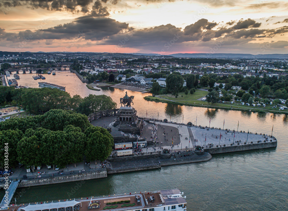 Obraz premium Sunset in Koblenz City Germany historic monument German Corner where the rivers rhine and mosele flow together