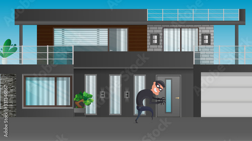 A thief sneaks into the house. The robber is trying to crack the door. Sign of a robbery. A surveillance camera recorded a thief. Security concept. 