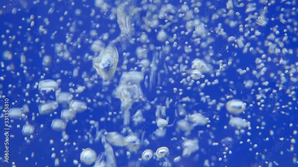 Pour fresh water into a cup bubbles. close- up macro selective focus. clean water Pour fresh water into a cup bubbles. close- up macro selective focus. clean water