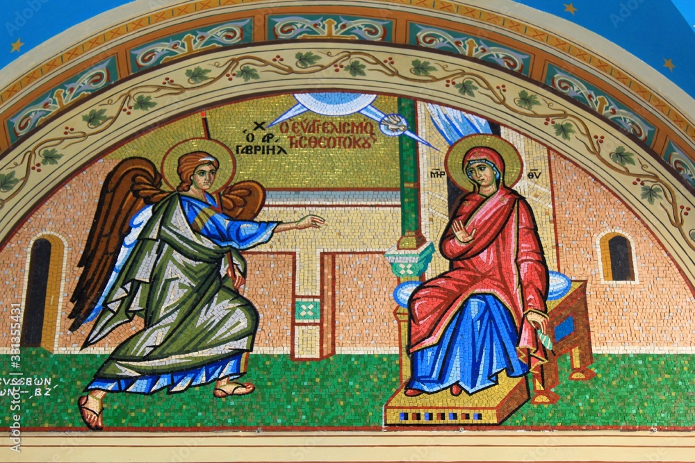 Beautiful mosaic showing the Annunciation to the Virgin Mary outside of Christian orthodox church in Athens, Greece.