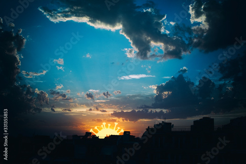 Blue sky with covid-19 sunset or sunrise on the city, world epidemic dangerous news for corona virus alerts and quarantine