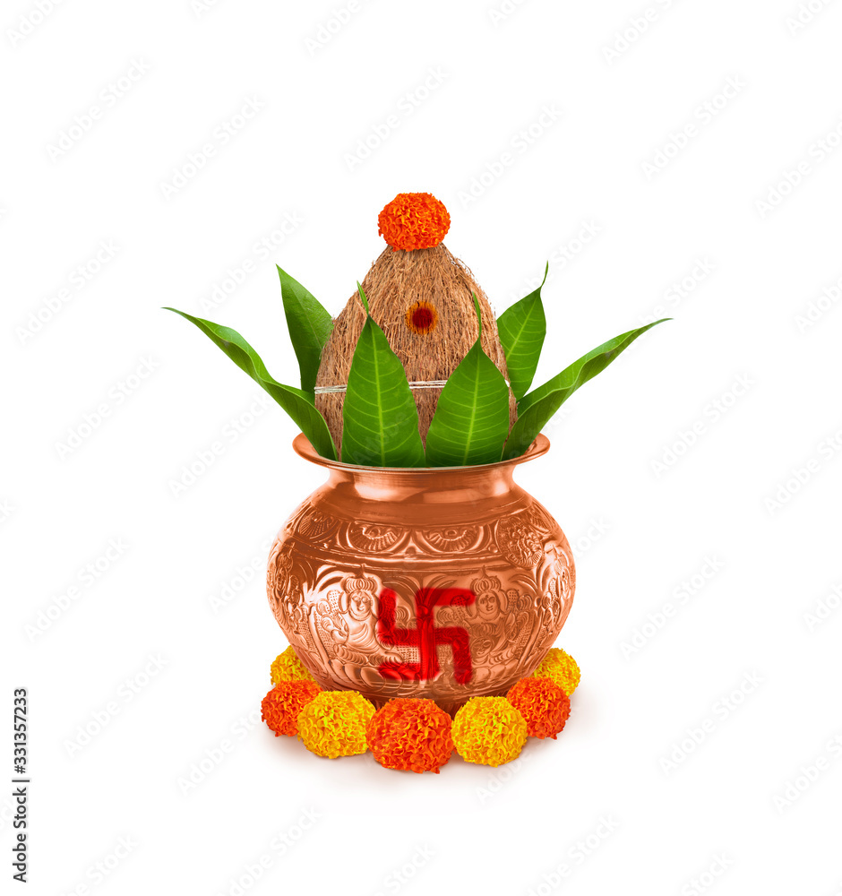 Copper and gold kalash with coconut and mango leaf with marigold flower