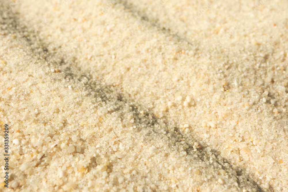 Close-up sand texture background with selective focus. Summer beach surface. Sandy nature backdrop Close-up sand texture background with selective focus. Summer beach surface. Sandy nature backdrop