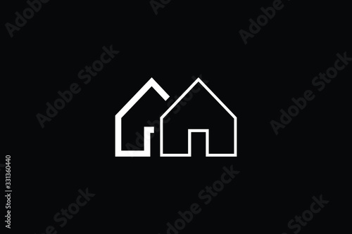 Logo design of G GM MG in vector for construction, home, real estate, building, property. Minimal awesome trendy professional logo design template on black background.