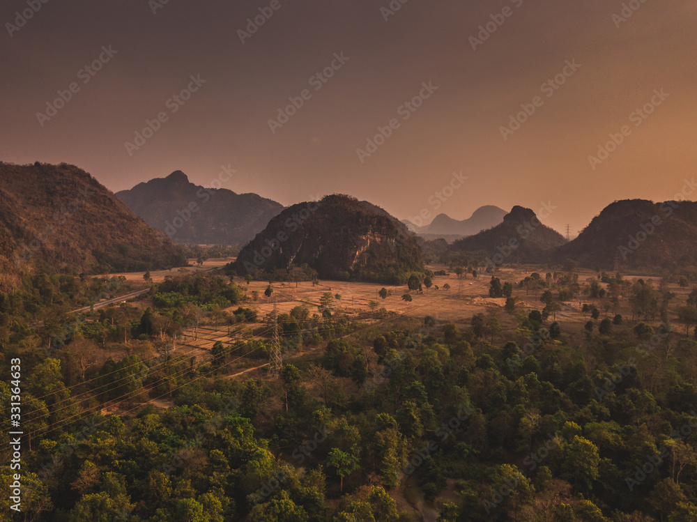 Amazing Laos landscape - drone shot of beautiful mountains at sunset