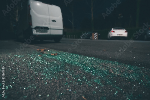 Принти на полотні Pieces of broken green tinted car glass