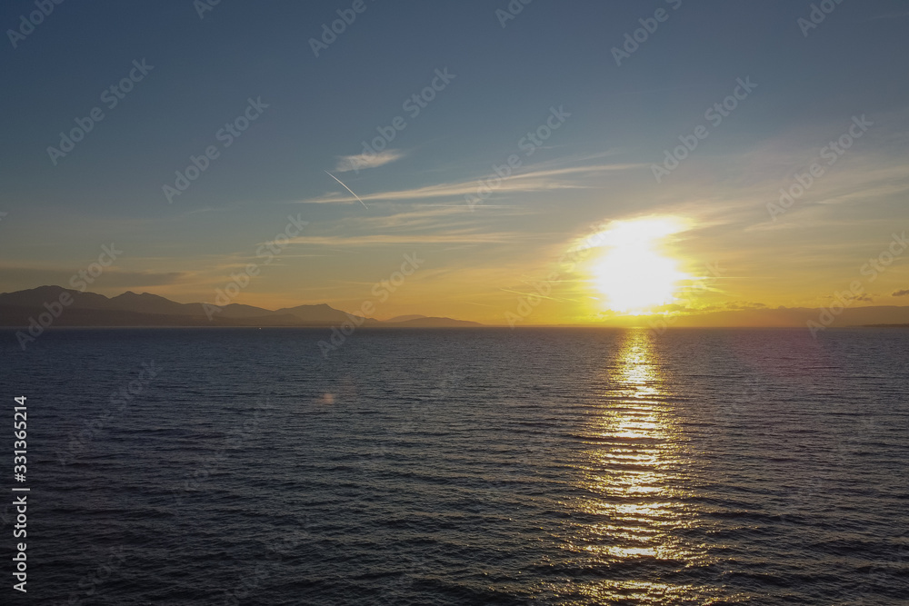 Beautiful colorful winter sunset above Lac Leman around Lausanne. Looking towards France