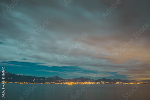 Panorama of the lake of Leman or Lac Leman on a cold winter night. Late night panorama of Lac Leman.