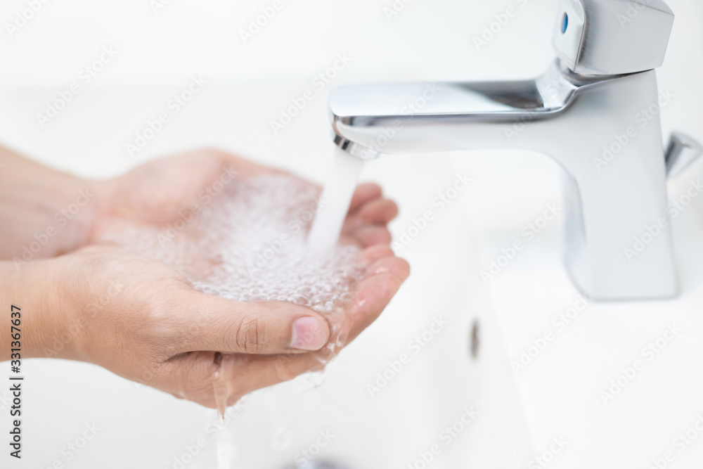 Cleaning Hands. Washing hand under the faucet with water Pay dirt Cleaning germs bacteria and virus for hygiene. Health care concept. Cleaning Hands. Washing hand under the faucet with water Pay dirt Cleaning germs bacteria and virus for hygiene. Health care concept.