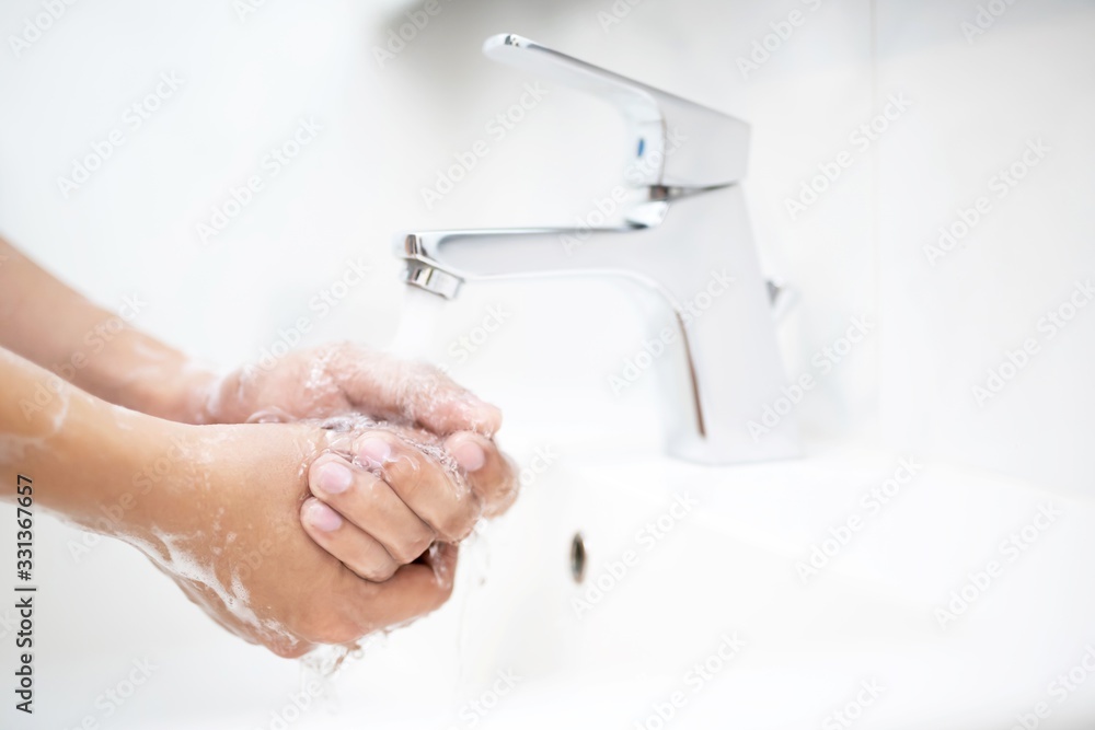 Hygiene. Cleaning Hands. Washing hands with soap under the faucet with water Pay dirt. Hygiene. Cleaning Hands. Washing hands with soap under the faucet with water Pay dirt.