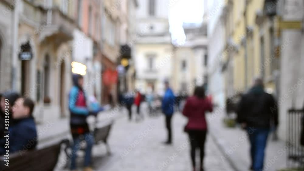 Abstract Defocused Blurred Background of many people on street Abstract Defocused Blurred Background of many people on street