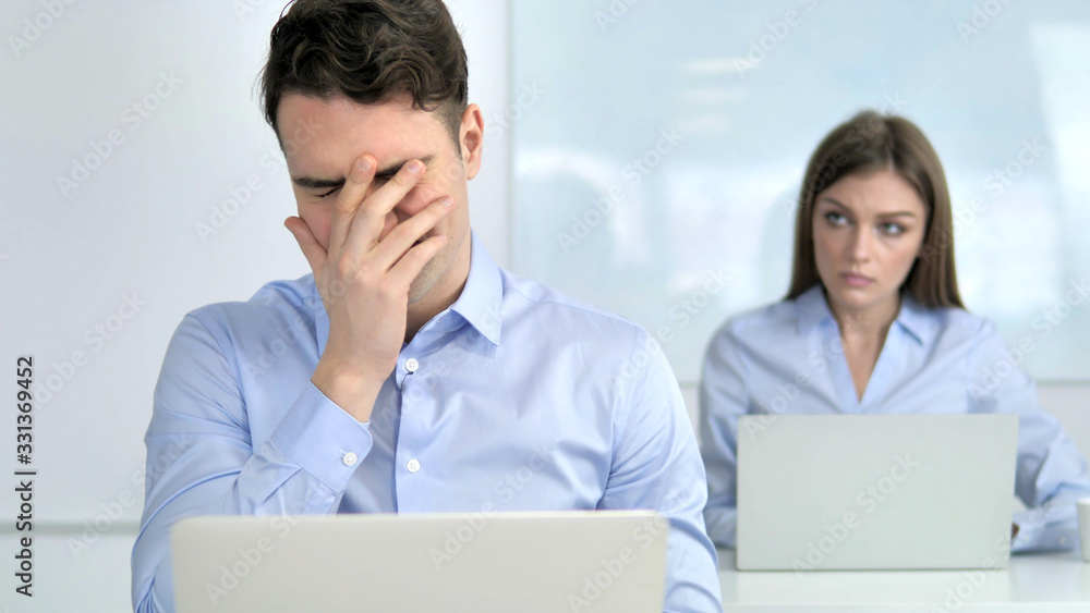 Sad Businessman Upset by Loss at Work Sad Businessman Upset by Loss at Work