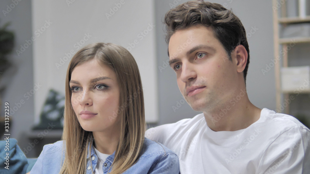 Close Up of Young Couple Looking at Camera Close Up of Young Couple Looking at Camera