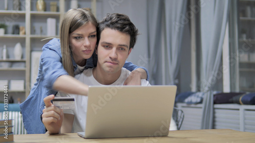Young Couple Online Shopping on Laptop, Online Banking