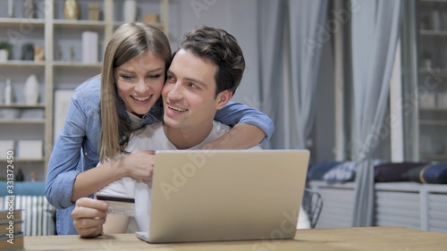 Successful Online Shopping by Young Couple, Credit Card