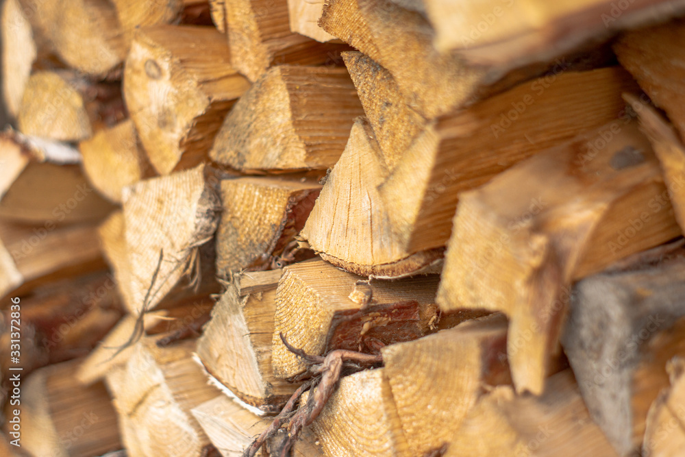 Side view of a pile of firewood, selective focus. Side view of a pile of firewood, selective focus.